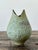 This striking studio pottery vase is a beautiful example of organic modernism, featuring an elegant teardrop silhouette...