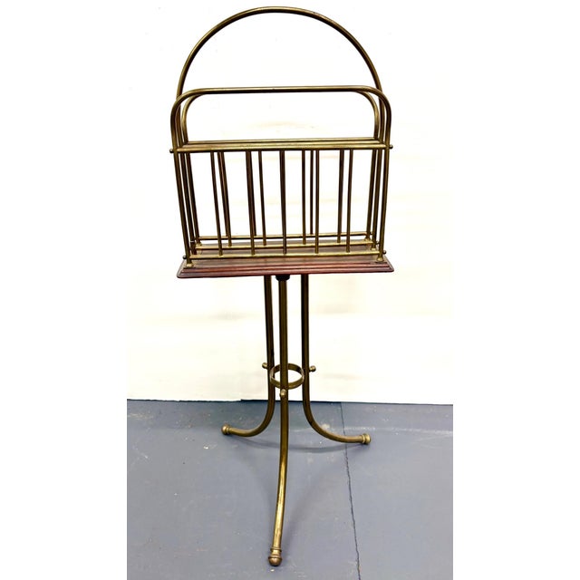 This unique design has the perfect brass patina and a walnut base.