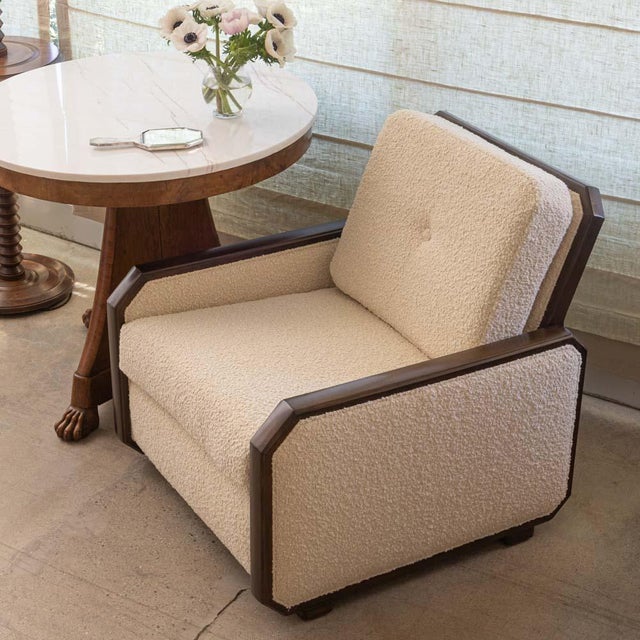 Stunning vintage Art Deco club chair from France. Beautiful sculptural wood frame with angled detail. Newly upholstered in...