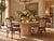 Elegant set of four vintage Italian dining chairs dating to the 1970s, designed in the French Provincial Louis XV style....