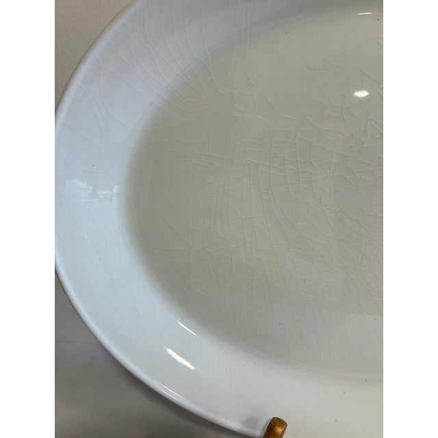 A classic vintage finds serving platter by Johnson Brothers of England, crafted in white ironstone with a soft glossy...