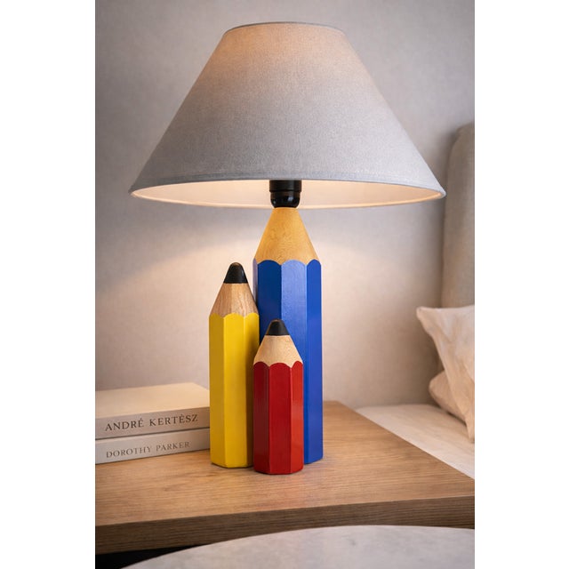 A designer table lamp created by French designer Pierre Sala in the 1980s, from a collection inspired by the world of...