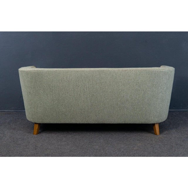 Object: Sofa Epoch & Style: 40s - 50s of the 20th century Features - comfortable seating - stands on four square, tapering...