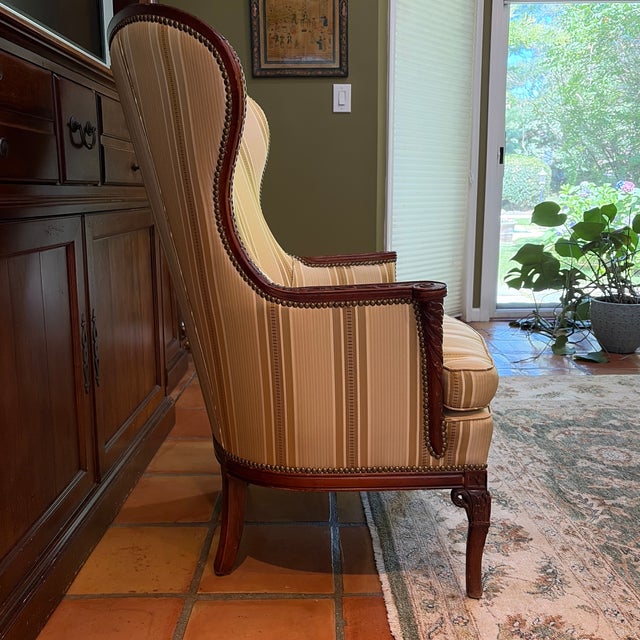 This comfortable, well crafted accent wing chair brings coziness and elegance to your living space. It is a well...