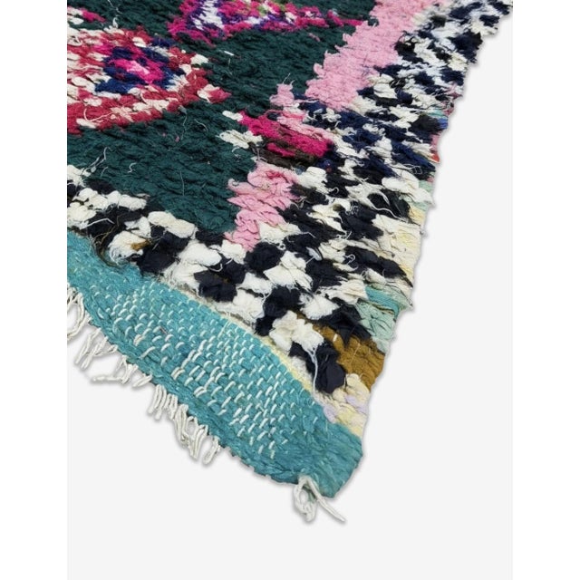 Vintage Boucherouite Rug | Handwoven Recycled Cotton Rug with Chevron Rows This vibrant vintage Boucherouite rug features...