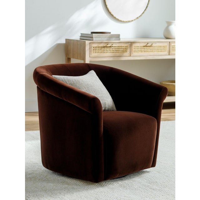 Indulge in the luxurious comfort and sleek sophistication of our Trumpet Swivel Chair. This modern minimalist beauty,...
