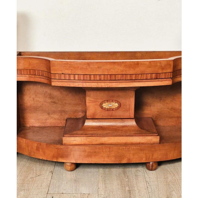 An Edwardian satinwood plant stand, England circa 1900.