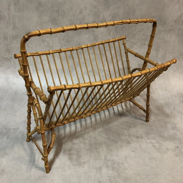 This magazine rack dates from the 1950s and comes in rattan and wicker. The piece is very light and can be completely...