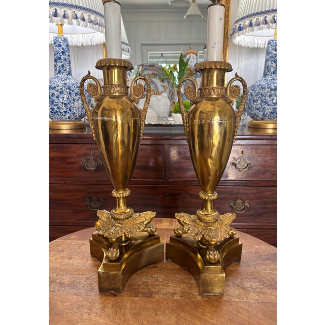 A truly spectacular pair of French gilt-bronze vase lamps in the Louis XVI style, probably made in the mid 19th century....