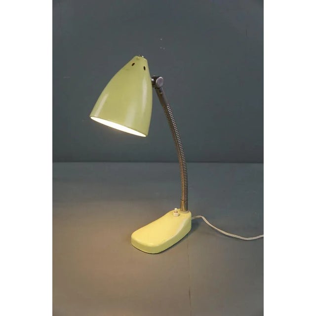 Offered is this nice yellow metal vintage 1960s design lamp/ desk lamp. This vintage desk lamp is perfect for your home,...