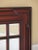 This is a large multi-panel beveled glass mahogany mirror. The piece is about 20 years old. Nice Carved Details High...