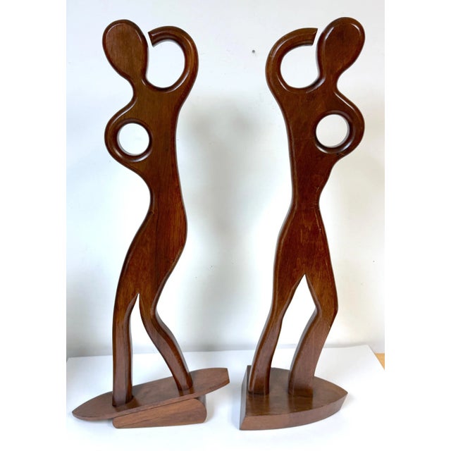 Pair William Westenhaver for Witco Teak Sculptures — The Boater and The Surfer A captivating pair of Mid-Century Modern...
