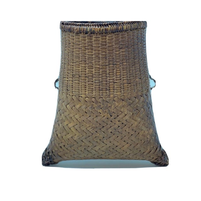 Vintage Asian Grain Gathering Basket. Basket is hand made from rattan straps tightly woven into the vessel you see before...