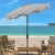 A classic market umbrella gets a chic makeover in grey and white with a stylish valance for extra sun protection and...