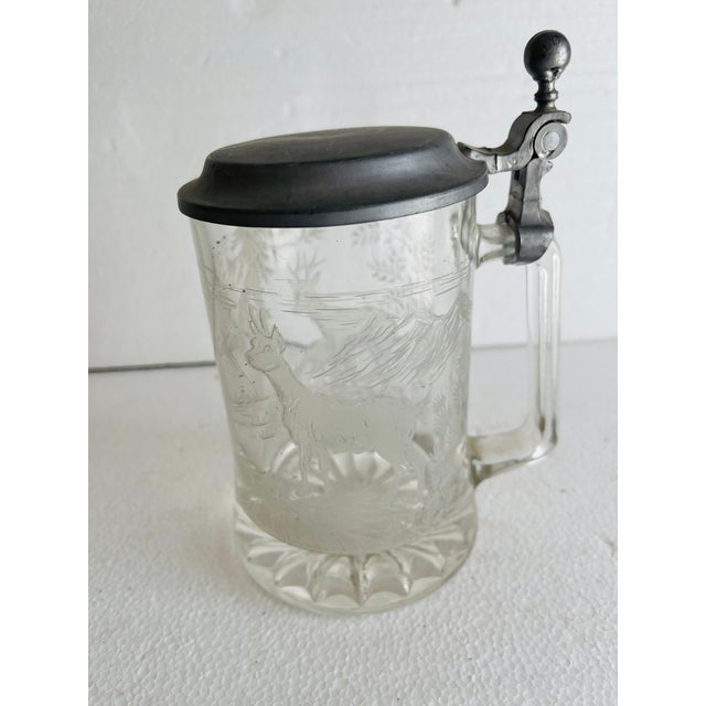Antique etched glass scene with deers beer stein goblet . Tin cover top. Collectible.