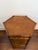 Vintage British Colonial Style Two Tier Hexagonal Side Table. Crafted from tortoise shell faux bamboo with rattan panels....