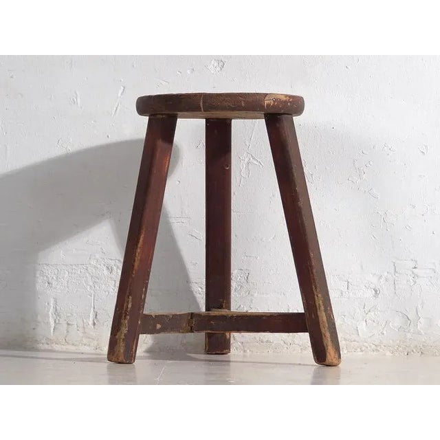 Antique dark colored round stool (c.1920) Dimensions: Diameter: 31 cm Height: 49 cm Style: Primitive Materials and...