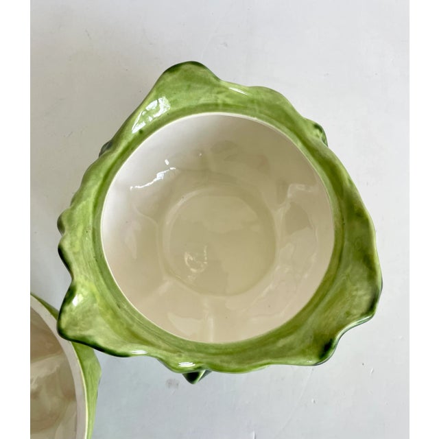 Here is a charming lidded bowl that looks like a bright green cabbage! The top of the "leaves" are shaped so that you can...