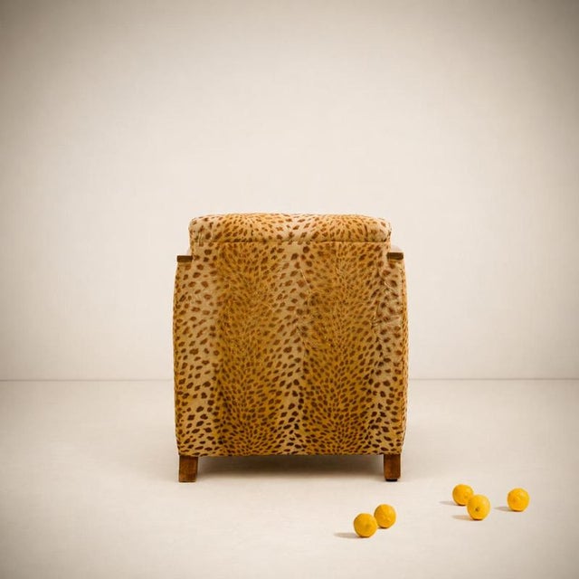 French work pair of "leopard" club armchairs france, circa 1930 walnut, wood, spring, horsehair, leopard-print fabric h....