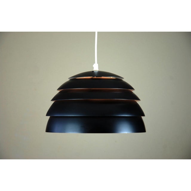 Lamingo T 352 pendant by Hans-Agne Jakobsson AB, Markaryd, Sweden. In addition to the pendant lamp, the Lamingo series a...