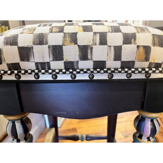 MacKenzie-Childs vintage counter stool. Upholstered in the traditional black/white Courtly Check fabric, braiding and nail...