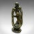 This is a vintage abstract family statue. A tribal African, polished hardstone decorative ornament, dating to the mid 20th...