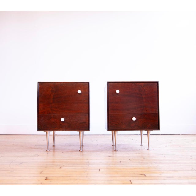 This is a pair of nightstands from the Thin Edge series, designed by George Nelson for Herman Miller in 1953. This is a...