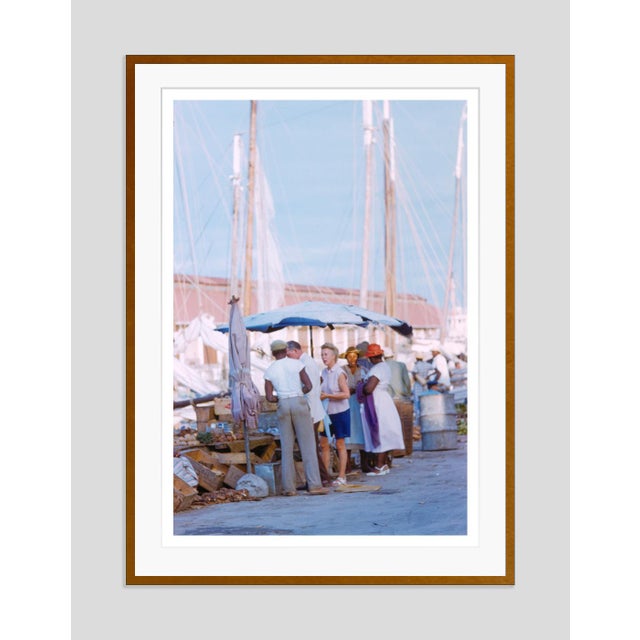 Nassau Harbour by Toni Frissell Tourists browse a harbourside market in Nassau, Bahamas, 1968. (Toni Frissell) Archival...