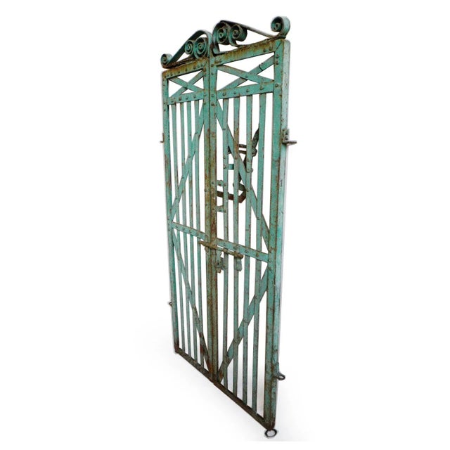 Beautiful vintage iron work gate from India. Original turquoise painted finish with lots of charm and character. Signs of...
