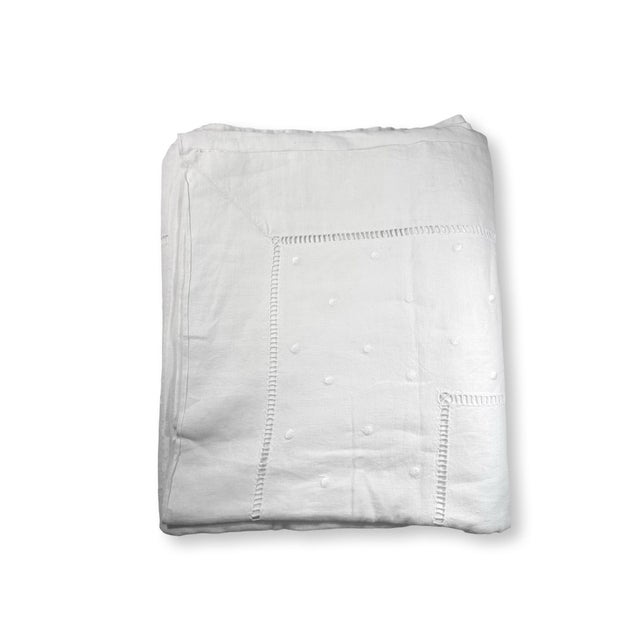 A quietly exquisite antique French linen sheet, drawn from a traditional trousseau and made during a time when even the...