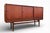A stunning Danish cabinet with an exceptionally lavish and well-thought-out interior. The combination of warm teak and...