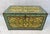 Charming vintage wooden storage trunk featuring hand-painted floral folk art decoration, showcasing colorful botanical...