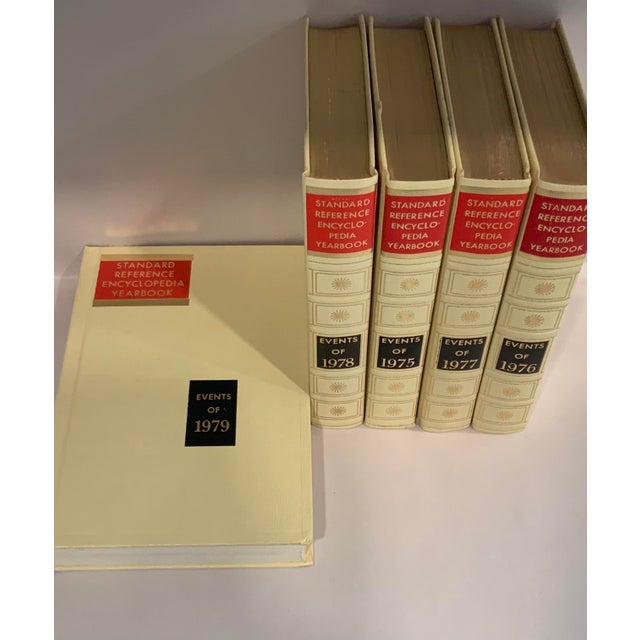 1970’s Funk and Wagnall leatherette and gold bound reference yearbooks. 1985-1979. Gold on top pages.