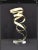 Beautiful flowing movement in this Dan Murphy "Ribbon" sculpture on a 6.5" x 6.5" Lucite base.