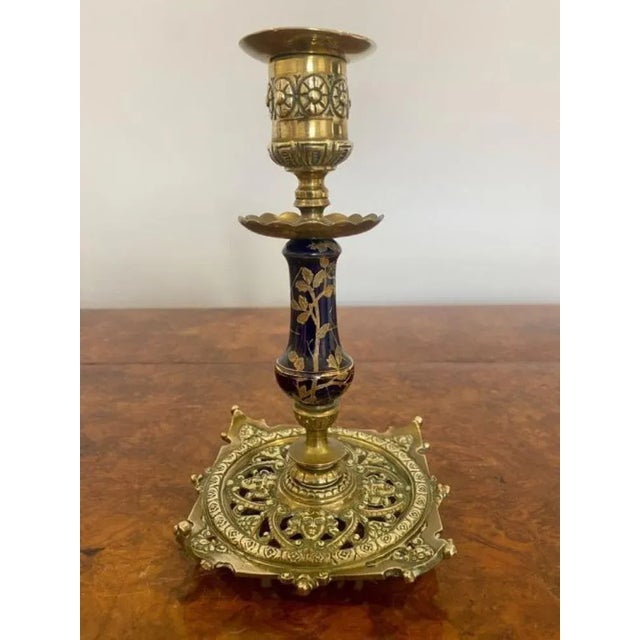 Unusual pair of antique Victorian quality brass & porcelain candlesticks having a quality ornate brass top with blue and...