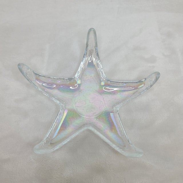 Beautiful iridescent glass starfish dishes. Great for tidbits, candy, nuts, small appetizers or using as a candle holder...