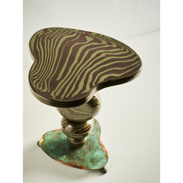 Elevate your space with the Alto Side Table. Hand built using traditional Nerikomi slab-building techniques. Ceramic...