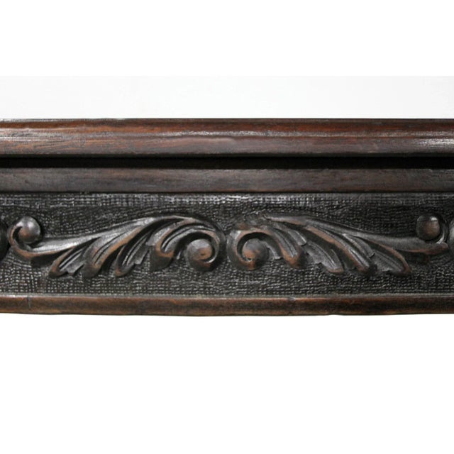 Late 19th century Italian table with carved detail.