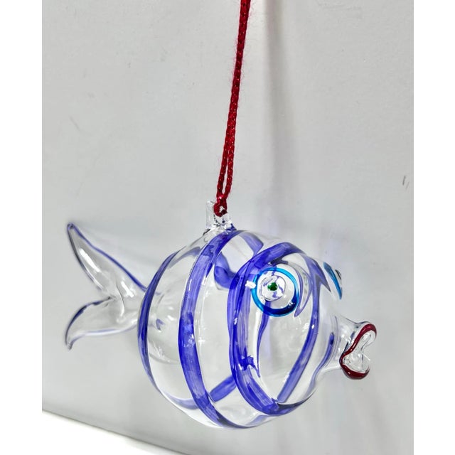 A lovely, artisan, hand-crafted ornament. The color detail is a wonderful addition. It's a great larger size so it won't...