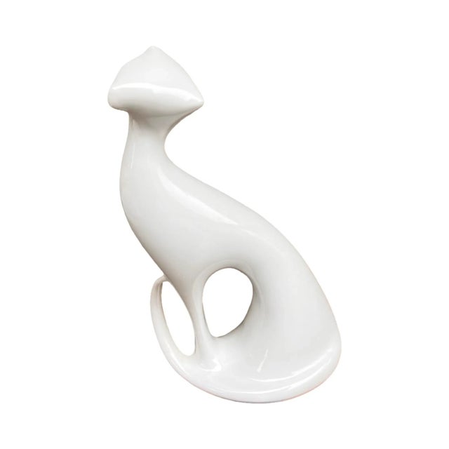A unique Brussels-style cat figurine, designed by Jaroslav Ježek for the renowned Royal Dux manufacturer in...