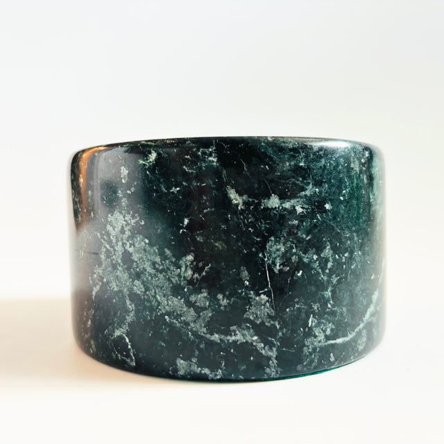 A vintage stone vessel. Nice modern cylinder shape. Beautiful moody dark green color with lovely natural variation to the...