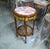 Introduce timeless French sophistication into your home with this exquisite Louis XVI-inspired side table, masterfully...