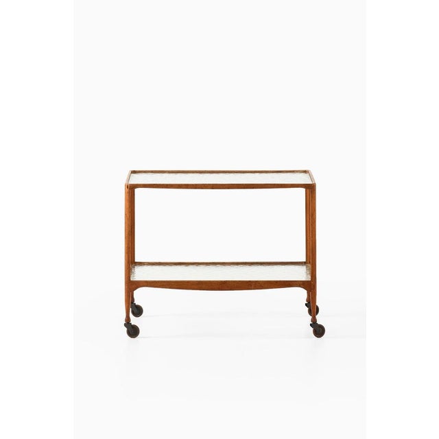 This rare and exceptional trolley was designed and handcrafted by the danish master cabinetmaker peder moos, produced in...