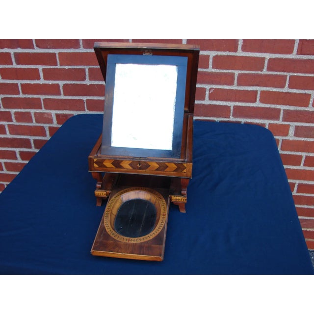 This antique marquetry necessaire is a stunning piece perfect for those who appreciate vintage sewing and grooming...