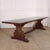 Wonderful early 20th century Italian walnut trestle table with a 2-inch thick top, carved trestle ends and a very good...