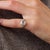 This extraordinary Art Deco engagement ring is a beautifully refined jewel from the 1930’s, centered by a GIA-certified...