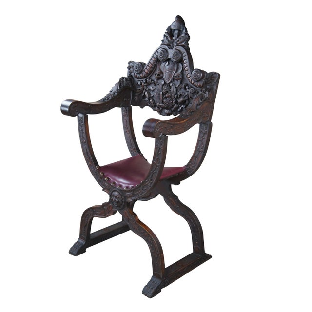 Exception mid 19th century Italian Renaissance Revival Savonarola Curule Arm Chair. Features a meticulously carved walnut...
