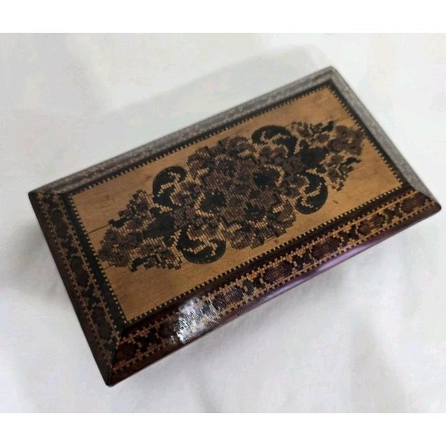 A fine antique Tunbridge Ware paperweight dating to circa 1850–1860, displaying the intricate decorative craftsmanship...