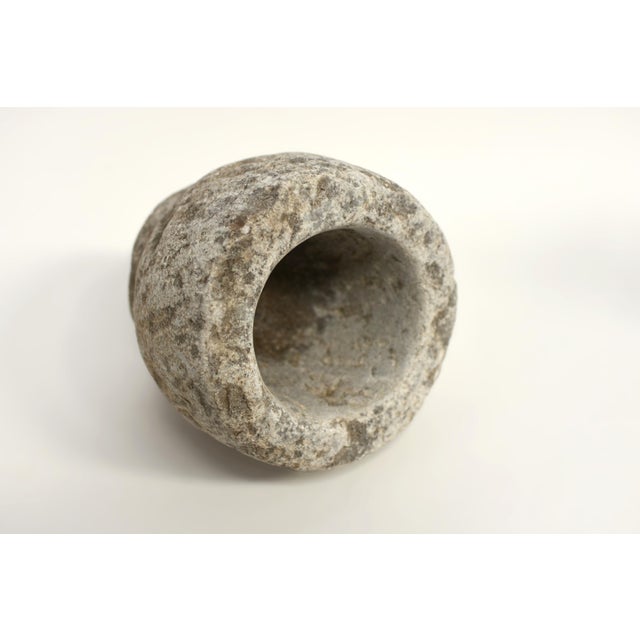 From Northern China comes a piece of great antiquity. The exceptionally large 18th century bowl of natural granite, hand...