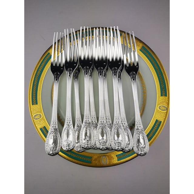 A superb solid silver dessert flatware set (minerva hallmark), crafted in the prestigious louveciennes pattern by the...